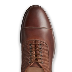 Brandy-colored woven leather lace-up
