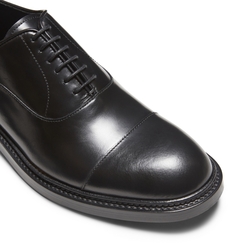 Black leather lace-up shoe
