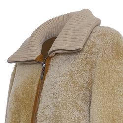 Reversible coat in tan shearling