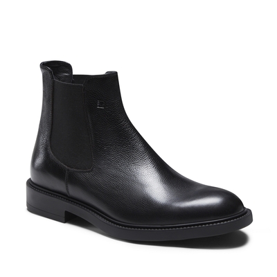 Ankle boot made of black leather with elastic inserts